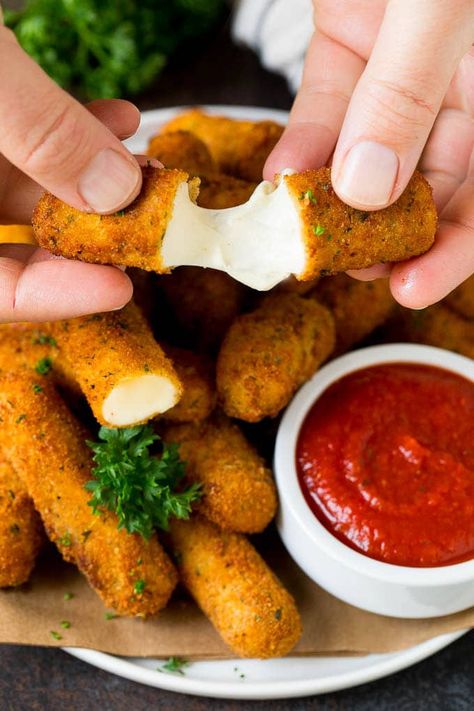 Mozzarella Sticks Recipe #cheese #appetizer #dinneratthezoo Cheese Sticks Recipe, Frozen Recipes, Homemade Mozzarella Sticks, Mozzarella Sticks Recipe, Fried Snacks, Homemade Mozzarella, Cheesy Appetizer, Mozzarella Cheese Sticks, Classic Appetizers