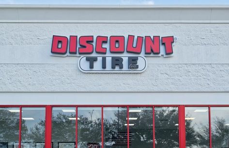 Discount Tire sign and store exterior in Humble, TX. stock photo Tire Graphic Design, Tire Advertising, Tyre Advertising, Store Exterior, Vintage Tire Ads, Car Tire Burst, Discount Tires, Building Maintenance, Vector Christmas