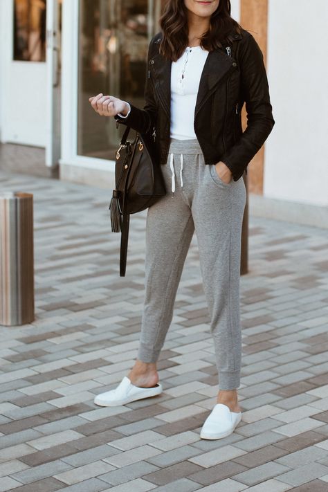 #athleisure athleisure style, grey jogger pants outfit, street style, fall style, black moto jacket outfit, jogger pants with moto jacket, black faux leather jacket outfit fall, casual fall outfit, outfit for running errands, fall style, #fall #fallfashion gray jogger pants and white thermal, white thermal outfit, white sneakers outfit, how to wear jogger pants, jogger pant style, classic style, weekend style, off duty outfit Faux Leather Jacket Outfit, Thermal Outfit, Black Joggers Outfit, Leather Jacket Street Style, Fall Jackets Outfit, Moto Jacket Outfit, How To Wear Joggers, Airplane Outfits, Jogger Pants Outfit