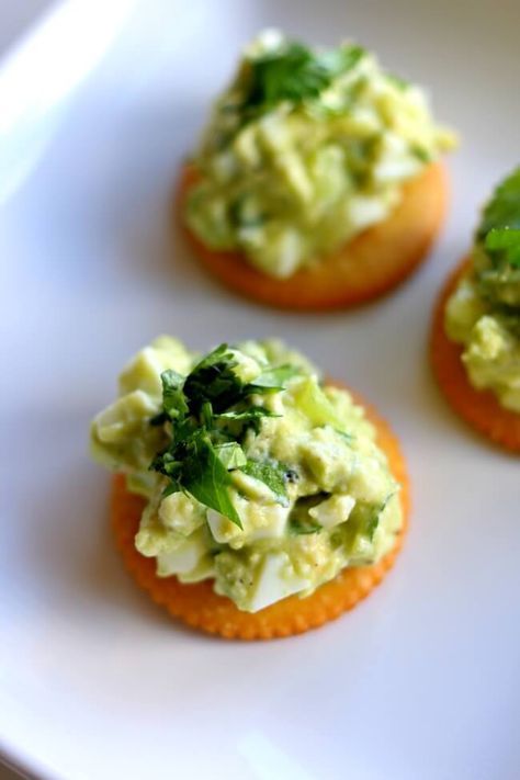 This is a sponsored post written by me on behalf of Mondelez International Group. All opinions are entirely my own. Avocado Egg Salad RITZ Cracker Snacks—smashed avocado is mixed with hard boiled eggs, chopped tomatillos, creamy Greek yogurt and cilantro and then slathered on top of a RITZ Cracker for a perfect snack or appetizer. … Avocado Recipes Easy, Avocado Egg Salad, Smashed Avocado, Cracker Snacks, Ritz Crackers, Egg Salad, Avocado Egg, Avocado Recipes, Hard Boiled Eggs