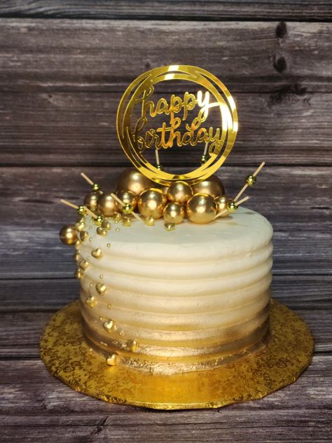 Gold airbrush and gold balls birthday decoration over frosting. Gold Cakes Birthday For Women, Simple Gold Cake Birthday, Cake Ideas For Golden Birthday, Gold Ombre Cake, Gold Balls Cake Design, Golden Birthday Cake Design, Gold Brushed Cake, Plain Birthday Cake, Gold Theme Birthday