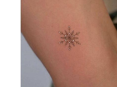 Snowflake Flower Tattoo, Snowflake Tattoos For Women, Tiny Christmas Tattoo, Snowflake And Flower Tattoo, Winter Themed Tattoos, Tree Star Tattoo, Dainty Snowflake Tattoo, Xmas Tattoo Design, Tiny Snowflake Tattoo