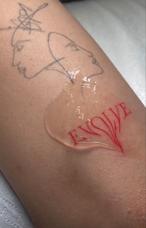 the word « evolve » in red tattoo anchor Dripping Word Tattoo, Evolve Tattoo Words, Red Art Tattoo, Cool Red Tattoos, Cute Red Ink Tattoos, Red Tattoo Faded, Red Swirl Tattoo, Dripping Tattoo Ideas, Small Pink Tattoo