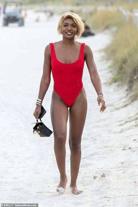 Dangerous curves: Elisa Johnson has bounced back in style, hitting Miami Beach in a one-pi... Elisa Johnson, Red Bathing Suits, Red One Piece, Magic Johnson, Bathing Suits, One Piece, Red