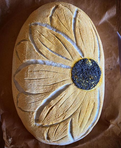 Easter Sourdough Bread Design, Sunflower Sourdough Bread, Sunflower Sourdough Scoring, Easter Sourdough Bread Scoring, Sourdough Bread Pattern, Flower Sourdough Scoring, How To Paint Sourdough Bread, Spring Sourdough Scoring, Easter Sourdough Scoring