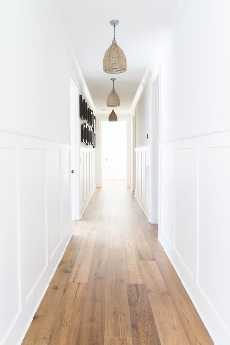 If there's a long hallway make it interesting with wood panelling? Board And Batten Hallway, Mid Century Modern Entryway, Hallway Lights, White Hallway, Hallway Walls, Wainscoting Styles, Hallway Inspiration, Narrow Hallway Decorating, Hallway Flooring