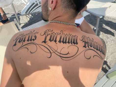 Fortis Fortuna Adiuvat Tattoo Design, Omerta Tattoo Design, Upper Back Tattoo Men, Fortis Fortuna Adiuvat Tattoo, Back Tattoos For Guys Upper, Fortis Fortuna Adiuvat, Justin Bieber Tattoos, Feminine Shoulder Tattoos, Word Tattoo Ideas