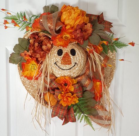 Such a cutie. Scarecrow straw hat wreath. marlas Autumn Hat Craft, Straw Hat Wreaths Front Doors, Straw Hat Crafts Ideas, Straw Hat Scarecrow Wreath, Straw Hat Wreath, Straw Hat Crafts, Sunflower Burlap Wreaths, Scare Crow, Scarecrow Crafts