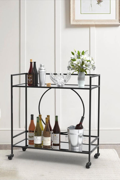 About this item DURABLE DESIGN-The 2 shelf tabletop made in Reinforced mirror and the frame in Special thickened steel tube, assemble them with our special screws, offer strong stability and durability even pushing the cart in moving LARGE CAPACITY-This storage cart measures 15"D x 32"W x 34"H, which can hold 20 bottles drink at least. The Max weight capacity of each shelf board is about 15 lbs Black Bar Cart, Mirror Shelves, Wine Cart, Hamptons Furniture, Bar Serving Cart, Metal Bar Cart, Bar Trolley, Liquor Bar, Shelf Board