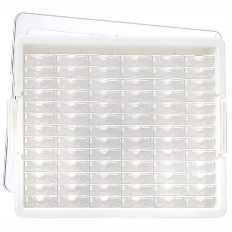 PRICES MAY VARY. Efficiently organize jewelry supplies with this tray, 78 small containers, 2 label sheets, a secure lid, and various sizes for maximum ease and organization Organizer removable tiny containers allow you to painstakingly sort and organize seed beads, crystals, findings, and small spacers, offering a stress-free and accessible jewelry-making experience Store beads and art supplies in a portable crafting organizer, providing convenience and mobility for creative projects while keep Jewelry Studio Workspaces, Jewelry Making Organization, Bead Storage Ideas, Jewelry Supplies Organization, Jewelry Studio Organization, Tiny Containers, Beads Organizer, Household Storage Containers, Plastic Storage Trays