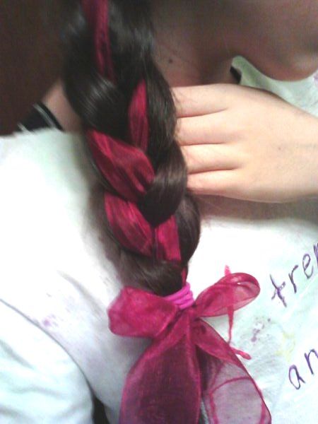 Red ribbon braid. Braid Ribbon Hair, Braids Tied With Ribbon, Braided Pigtails With Ribbon, Ribbon In Braid, Red Hair Ribbon, Wrap Around Braid, Hair Jewelry For Braids, Twin Braids, Thick Braid