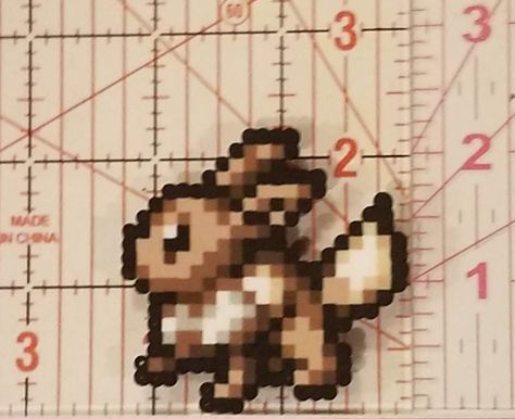 Eevee pokemon made out of perler beads. 3d Eevee Perler Beads, Eevee Pixel Art, Pokémon Perler Beads, Pokemon Bead, Pokemon Perler Beads, Easy Perler Bead Patterns, Perler Creations, Cool Pixel Art, Melty Beads