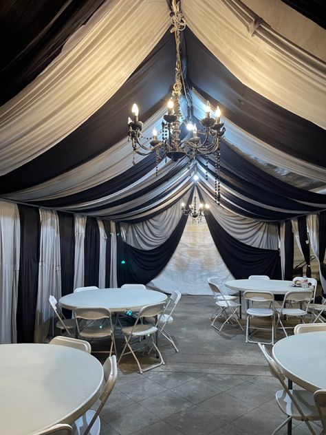 #60thbirthday #elegant #blackandgray #chandelier Party Under Carport, Black And White Tent Draping, Tent Draping Birthday, Tenda Nikahan, Halloween Party Tent, Drapes For Party, Party Draping, Party Tent Decorations, Draped Tent