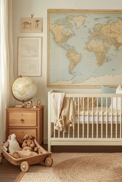 Travel-inspired nursery with vintage world map, natural wood furniture, and cozy, neutral decor. Maps Nursery Theme, World Map Nursery Theme, Airforce Nursery, Gender Neutral Travel Themed Nursery, Nursery Ideas Travel Theme, World Travel Nursery Theme, Gender Neutral Travel Nursery, Explore Nursery Theme, Travel Nursery Ideas