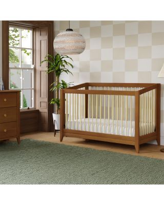 Features • Tapered spindles and triangular feet bring nostalgic charm to this crib's modern shape• With a subtle raised back, Sprout can grow with your babe with a smart full-size bed conversion• Greenguard Gold certified: The Sprout has been tested for over 10,000 chemical emissions and VOCs, undergoing rigorous scientific testing to meet some of the world's most stringent chemical emissions requirements. It contributes to cleaner indoor air, creating a healthier environment for your baby to sl Nursery Mid Century Modern, Baby Changing Tables, Stylish Nursery, Nursery Modern, Nursing Pillows, Improve Indoor Air Quality, Adjustable Mattress, Nursery Crib, Toddler Furniture