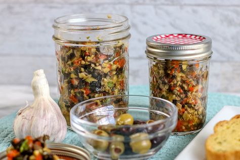 Fresh and Tangy olive salad, in a light garlic dressing. This is a Meal Prep fridge staple. Use on sandwiches, salads, pasta, chicken and fish. Muffaletta Olive Salad Recipe, Meal Prep Fridge, Muffaletta Recipe, Celery Snacks, Sandwich Recipes Panini, Olive Salad Recipe, Mealprep Lunch, Parsley Dressing, Hot Sandwich Recipes