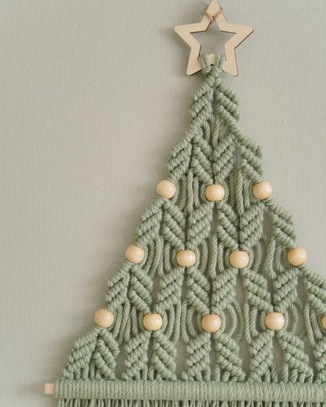 BeanDaikon Macrame on Instagram: "🎄 Allow us to present our "Boho Christmas Tree" 🌟! This charming creation blends the holiday magic with contemporary artistic vibes. It brings a rustic, cozy ambiance to your winter home decor 🏡❄️. The macrame design sets it apart, making it not just a festive holiday tree but also a chic addition to your nursery's wall art collection 🎨👶. 👉 Message us now! #macramewallart #bohovibe #handmadecurator #walldecorations #macrameknots #homedecoratingideas #handcraft Boho Christmas Tree, Winter Home, Cozy Ambiance, Macrame Wall Art, Wall Art Collection, Boho Christmas, Macrame Knots, Winter Home Decor, Holiday Magic