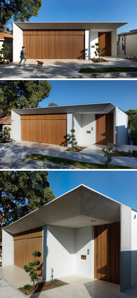 From the street, this modern house has a wood garage that matches the front door. The front door has been slightly set back to provide some protection from the elements. Garage Facade Ideas, Garage Door Wood, Minimal Garage, Garage Facade, Wood Garage, Modern Garage Doors, Wood Garage Doors, Garage Door Design, Modern Garage