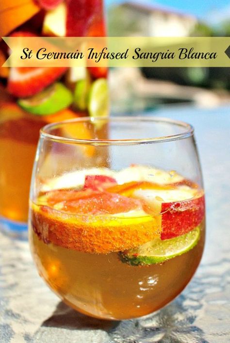 St Germain Infused Sangria Blanca- A refreshing white sangria infused with elderflower liqueur. Perfect for spring! Sangria Blanca, Festive Cocktail Recipes, St Germaine, White Wine Sangria, Spring Entertaining, White Sangria, Best Cocktail Recipes, Festive Cocktails, Drinks Cocktails