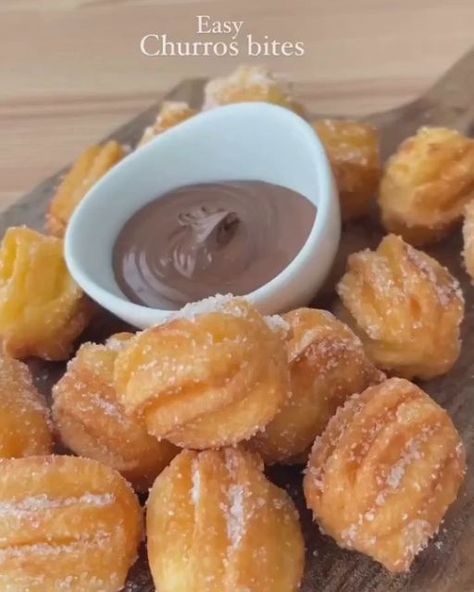 Sweettheavens on Instagram: "CHURRO BITES   🎥 by @kooki_lovescooking  Follow @sweettheavens for daily snacks🍟  Ingredients 75ml of water 1 tsp of sugar 20g of butter 55g of flour + a pinch of salt 1 egg  In a saucepan over medium heat, pour the water, butter, sugar and bring to a boil.  Remove the pan from the heat and stir in the flour. Mix until you get a smooth paste. Put the pan back on low heat for a few seconds and mix. Remove the pan from the heat, add the egg and stir until fully incorporated.  Sprinkle with sugar." Easy Churros, Mini Churros, Churro Bites, Peri Peri, Dandelion Recipes, Sweet Snacks Recipes, Delicious Snacks Recipes, Fair Food Recipes, Food Recepie