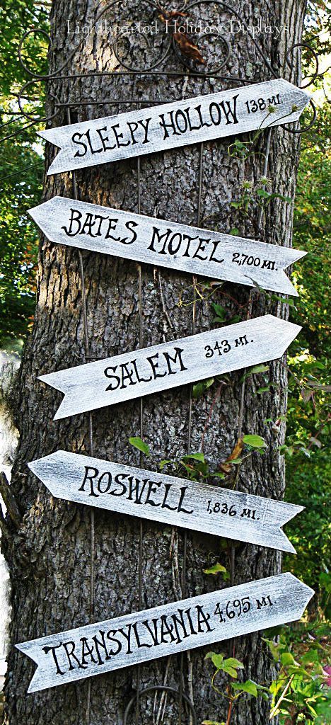 Point out spooky attractions near and far with a homemade sign post hung up on a tree. Other potential destinations to point out to your trick-or-treaters? Amityville, Elm Street and Frankenstein's Castle. Click through for more on this and other outdoor Halloween decorations. Diy Halloween Dekoration, Festive Halloween Decor, Halloween Decor Diy, Hallowen Ideas, Casa Halloween, Halloween Memes, Diy Halloween Decor, Harry Potter Halloween, Adornos Halloween