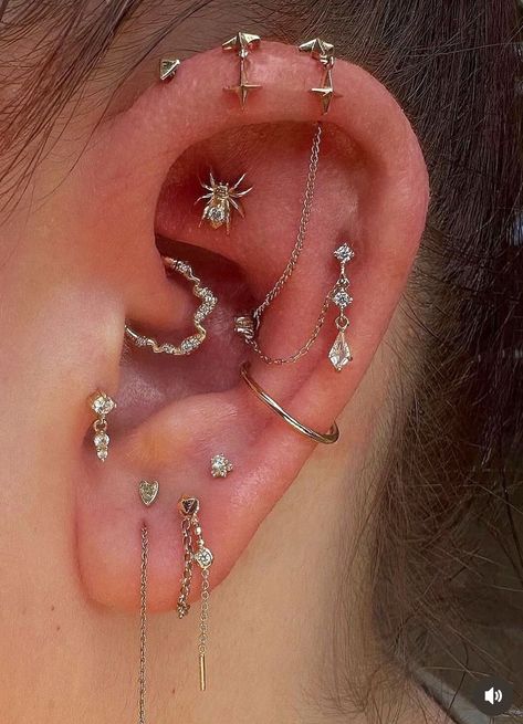 Constellation Piercing Ideas, Stylized Ear Piercing, Styled Ear Piercings Silver, Piercing Inspo Silver, Themed Ear Piercings, Heavily Pierced Ears, Silver Ear Curation, Piercing Stack Ideas, Ear Constellation Piercings