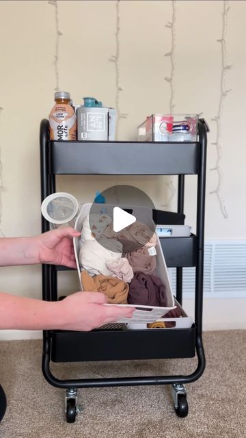 Sonja Joubert on Instagram: "Fun fact: I was putting this bedside postpartum cart together during the beginning of labor when I was trying to decide if I should call my midwife or not 😅  Here’s what you REALLY need in your cart! I see a lot of these kind of videos with a lot of unnecessary items. You really don’t need much, especially if you are planning on exclusively breastfeeding (not pumping at all or very often).  Bottom tier: baby sleepers/pjs — our favorites are the bamboo ones from @katequinn_shop. Because they are so stretchy, they last longer because they fit longer! Axel is still wearing the 0-3 size even though he is 16 lbs. Second bin is burp cloths, love using muslin ones since they are more absorbent.  Middle tier: diapers, wipes, a changing pad, any personal care items we Postpartum Cart Bedside, Postpartum Bedside Cart, Postpartum Cart, Ayurvedic Postpartum, Exclusively Breastfeeding, Baby Sleepers, Personal Care Items, Changing Pad, Fun Fact