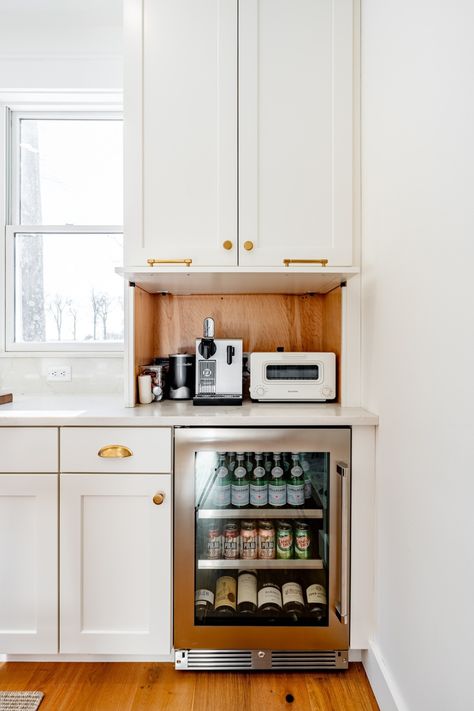 From coffee machines and ice makers to toasters and blenders, counters can quickly become overcrowded, especially in compact kitchens. Appliance garages offer the perfect solution, maximizing counter space while elevating kitchens with a touch of grace. Simply tuck countertop gadgets behind closed cabinet doors when they’re not in use and easily pull them out when needed. 📸: Apuzzo Kitchens | Top Knobs | Decorative Hardware | Appliance Garage | Space Saving Solutions | Kitchen Organization | Garage Door Kitchen Cabinet, Appliance Garage Corner Cabinet, Kitchen Cabinet Hide Appliances, Hiding Countertop Appliances, Hidden Countertop Appliances, Kitchen Garage Cabinet, Appliance Garage With Pullout, Small Appliance Garage, Counter Depth Refrigerator Cabinet