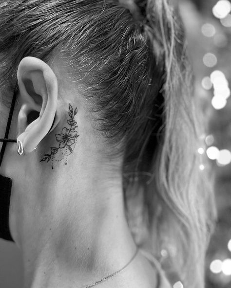 Small Flower Behind Ear Tattoo, Lily Ear Tattoo, Behind The Ear Tattoo Ideas Floral, Floral Behind The Ear Tattoo, Being The Ear Tattoos, Plumeria Tattoo Behind Ear, Behind The Ear Floral Tattoo, Floral Tattoo Behind Ear, Lily Of The Valley Ear Tattoo