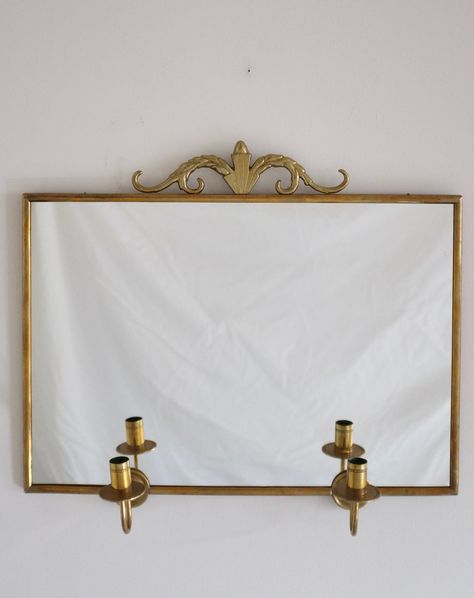 New on the website - Brass Mirror with two candle scones by Firma Lars Holmström Arvika. Studio Nordic NYC. #midcenturymodern #midcenturyfurniture #midcenturydesign #vintage #studionordicnyc #scandinavian #architecture #design #swedishmodern #larsholmström #arvika #brass #mirror #candlescones #svenskttenn #hansagnejakobsson #nordiskakompaniet #scandinviandesign #swedishdesign #swedishgrace Candle Scones, Scandinavian Architecture, Brass Mirror, Swedish Design, Mid Century Furniture, Mid Century Design, Scones, Midcentury Modern, Architecture Design