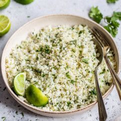 Chipotle Cauliflower, Lime Cauliflower Rice, Lime Marinade For Chicken, Enchilada Sauce Easy, Cilantro Lime Rice Recipe, Isabel Eats, Lime Rice Recipes, Copycat Chipotle, Cilantro Lime Cauliflower Rice