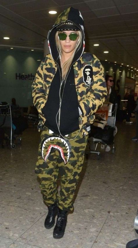 Splurge: Rita Ora’s Heathrow Airport A Bathing Ape 1st Camo Varsity Light Down Jacket, Shark Gore-Tex Windstopper Sweatpants, and Louis Vuitton Palm Canyon Desert Boots Account Photo, Hoodie Bape, Palm Canyon, Light Down Jacket, Bape Hoodie, Heathrow Airport, Hoodie And Sweatpants, Jacket Hoodie, Home For Christmas