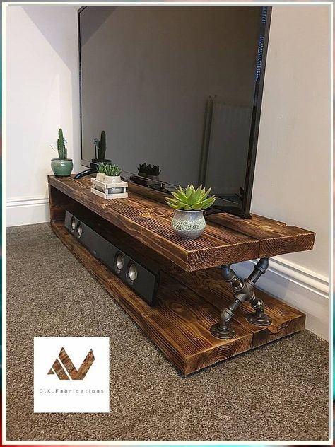 This table is the perfect addition to any kitchen! It's easy to build and can be customized to fit your needs. Industrial Tv Unit, Console Table Rustic, Tv Stand Unit, Industrial Tv Stand, Rustic Tv Stand, Tv Rack, Tv Stand Designs, Tv Stand Decor, Diy Tv Stand