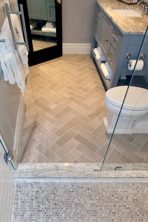 Hering Bone Flooring Bathroom, Beige Herringbone Tile Bathroom, Bathroom Herringbone Tile Floor, Chevron Bathroom Tile, Herringbone Tile Floor Bathroom, Herringbone Tile Bathroom Floor, Bathroom Herringbone Tile, Herringbone Bathroom Floor, Coastal Bathroom Tile