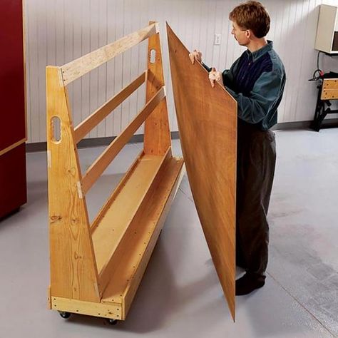 Carrying plywood any distance can quickly turn into a wrestling match, but you'll win hands down when you use this mobile storage rack. And building it won't bust your budget either. All you need is plywood, dimensional lumber, casters, and wood screws. Plywood Storage Rack, Plywood Cart, Lumber Storage Rack, Plywood Storage, Lumber Rack, Wood Storage Rack, Rolling Rack, Lumber Storage, Woodworking Kits