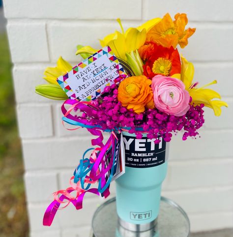 Yeti cup with hot pink babies breath, ranunculus, poppy’s and yellow lilies. With hand stamped note! Teacher Appreciation Bouquet Ideas, Teacher Flower Arrangements, Flower Teacher Appreciation Gifts, Yeti Gift Ideas, Back To School Flower Arrangements, Teacher Flower Gifts, Teacher Appreciation Flowers Ideas, Flower For Teacher, Teacher Appreciation Flowers