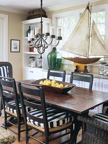 Nautical dining room with farmhouse table is so inviting via BH&G Nautical Kitchen, Dining Room Chair Cushions, Coastal Kitchen, Nautical Home, Nautical Decor, Nautical Theme, Room Table, Cottage Decor, Coastal Decor