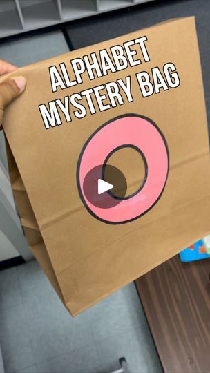 31K views · 6.9K reactions | Letter “O” Mystery Bag! Finally got the chance to use one of my Alphabet Mystery Bags!! It includes items that were already in my classroom and I literally gathered them up the morning of. Other bags may have more but this was just right for our first one. We’ve been learning one letter a day for about a month now (abc bootcamp). Adding this mystery bag made it even more FUN!! I’ll add these letters to my TpT for anyone interested in this idea too! 🐙 

And for those asking - I got the light switch at the dollar store a few years ago!

#iteachk #learnthroughplay #playtolearn #alphabetmysterybag #learningisfun #abcbootcamp
#joyfullearning #happyclassrooms #kindergartenteacher #kindergarten #newteacher #elementaryteacher #teaching #iteach #prek#earlychildhoodeduc Letter Sound Activities Preschool Fun, Letter O Activities For Kindergarten, Letter O Crafts For Preschoolers, Letter O Activity, Letter O Activities For Preschool, Mystery Bag Ideas, Letter Monster, Abc Bootcamp, Mystery Box Ideas