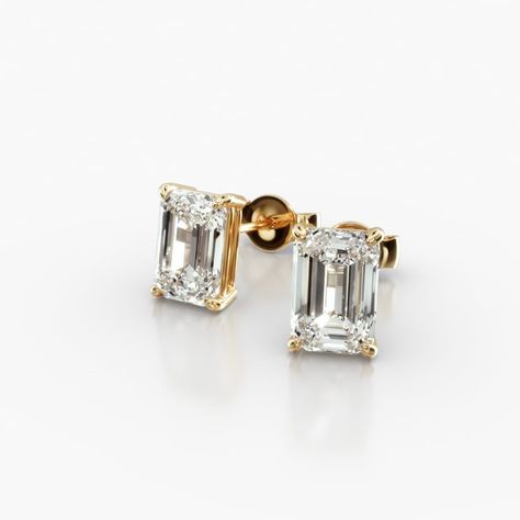 14K Yellow Gold Emerald Cut Lab-Grown Diamond Stud Earrings (1.50 CTW - F-G / VS2-SI1). This pair of classic pear shape diamond earrings feature a tapered basket, showcasing the unique characteristics and striking outline of a pear shape diamond. Splinters of light shimmer and shine with every move. Emerald Cut Diamond Earrings, Jewelry Photoshoot, Colorless Diamond, Emerald Cut Diamond, Unique Characteristics, Diamond Stud Earrings, Pear Shaped Diamond, Diamond Stud, Emerald Cut Diamonds