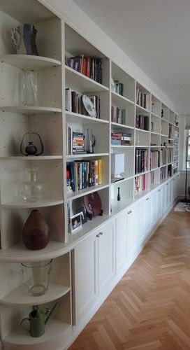 Bookcase with rounded corner Built In Bookshelves Around Corner, Curved Corner Bookshelves, Corridor Bookshelves, Round Corner Shelves, Rounded Corner Shelves, Built In Corner Shelves Living Room, Corner Bookcase Ideas, Rounded Corner Cabinet, Rounded Bookcase