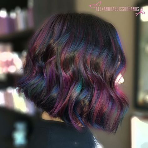 Gorgeous!! "Oil Slick" Balayage. Such a fun color! More multi-tones please!! In this technique I used thick slices to balayage underneath her hair with @colormebykm Up to 7 lightener (with Olaplex) then used 4 custom @Joico vivids (used Magenta, Indigo, Anethyst, Peacock Green, Yellow, Sapphire and Light Purple) all mixed in with @Olaplex step 2. I painted each slice with 2 colors per foil for a more "holographic" or "oil slick" look! Oil Slick Hair, Ombré Hair, Oil Slick, Haircut And Color, Colorful Hair, Rainbow Hair, Hair Game, Hair Envy, Grunge Hair