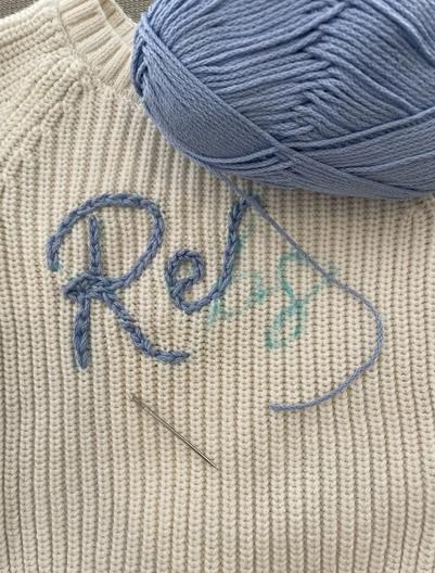 How To DIY a Hand Embroidered Name Sweater • Emily Rone Home How To Embroider By Hand, Embroidered Sweatshirt Diy, Embroidery Sweater Diy, Embroidered Name Sweater, Embroidered Ideas, How To Embroider Letters, Hand Embroidery Letters, Amigurumi Plushies, Hand Embroidered Name