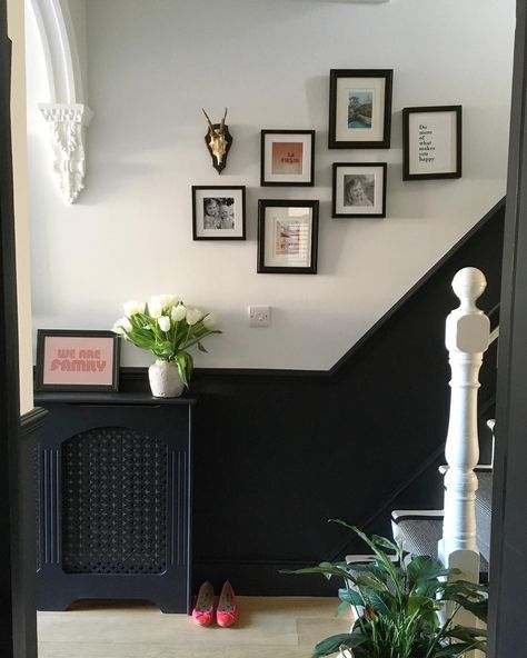 Emily on Instagram: “Hallway update! We’re getting there finally. The radiator cover is painted and it’s starting to feel a little more finished! 🖤 . (AD) love…” 1930s Renovation, Hallway Update, Stairs Office, Black Hallway, Black Radiator, Half Painted Walls, Stair Paneling, Hallway Paint, Victorian Hallway