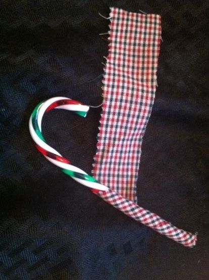 fabric covered candy canes, crafts, seasonal holiday decor, Hot glue one end then wrap the fabric around the candy cane Fabric Candy Canes, Outdoor Christmas Decorations Lights, Homemade Fabric Softener, Candy Cane Ornaments, Fabric Candy, Primitive Country Christmas, Candy Cane Crafts, Christmas Candy Canes, Mercury Glass Christmas Ornaments