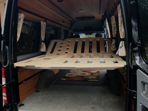 Van conversion bed adjusts from both ends: instant chaise lounge when the view demands Bed Deck, Campervan Bed, Diy Van Conversions, Van Bed, Camper Beds, Sprinter Conversion, Campervan Interior, Camper Van Conversion Diy, Van Interior