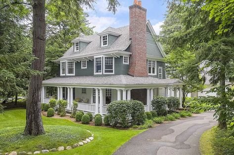 410 Glenn Dr, Harbor Springs, MI 49740 | Zillow Colonial Exterior, Harbor Springs, Dormer Windows, Subway Tile Backsplash, House Exteriors, Colonial House, Back Patio, Gas Fireplace, Real Estate Professionals