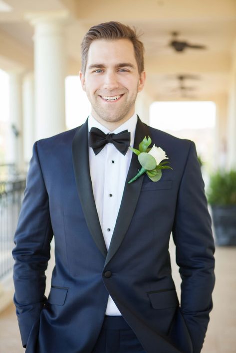 Southern summer groom with a navy and black tuxedo, bow tie and white rose boutonniere. From Emma & Will’s wedding. Photography by Krista Lee Photography. #weddings #groom #boutonniere     Venue: @The Grove  Tuxes : @Ted Baker and @The Black Tie  Florist: @Rebecca Fly Navy Tuxedo Wedding, Summer Groom, White Jeans For Men, White Tuxedo Wedding, Blue Tuxedo Wedding, Navy Tux, Groom Tuxedo Wedding, Navy Groom, Blue Tux