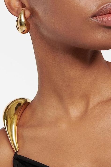 These sleek, 18K gold-dipped chunky hoops have a teardrop appearance when seen head-on due to its tapered top at the post; they’ll add a fun element of surprise to your everyday outfit. Jewelry Chunky, Drop Hoop Earrings, Tear Drop Earrings, Gold Dipped, Everyday Outfit, Water Drops, Tear Drop, Teardrop Earrings, Earrings Jewelry