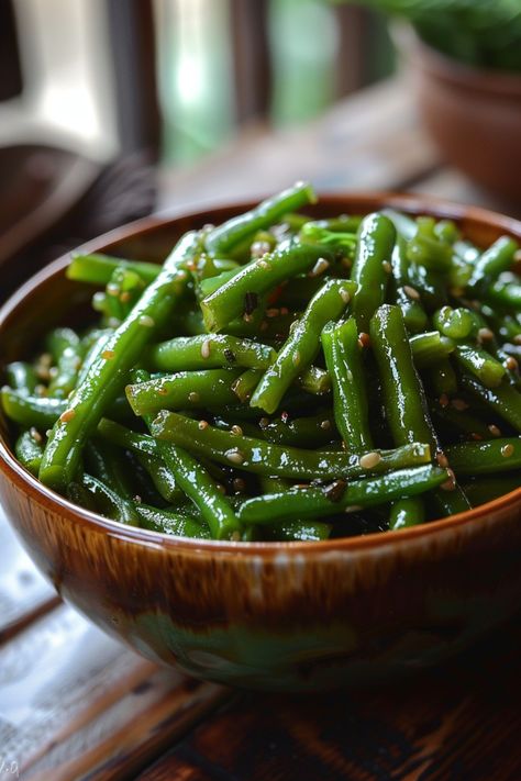 Green beans seasoned with sesame seeds in a wooden bowl. Green Beans Vegetarian Recipe, Different Ways To Make Green Beans, Tasty Green Beans Recipe, Perfect Green Beans, Dark Green Vegetables Recipes, Best Way To Cook Canned Green Beans, Greenbean Side Dish Recipes, Best Frozen Green Bean Recipe, Southern Green Beans Recipe Canned