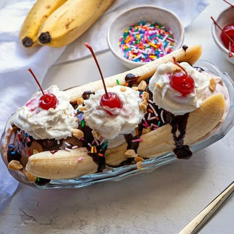 Devorah | The Yummy Vegan on Instagram: "HAPPY NATIONAL BANANA SPLIT DAY I’ve enjoyed plenty of Vegan Ice Cream but haven’t had a Banana Split in years! Now that there are some really great Vegan Ice Cream brands out there what better way to celebrate 🎉 Ingredients: 1 Banana split lengthwise 1 scoop @oatly Vanilla Ice Cream 1 scoop of @nadamoo Chocolate Ice Cream 1 scoop of @oatly Strawberry Ice cream @reddiwip Dairy Free Vegan Whip Cream @santacruzorganic Organic Chocolate Syrup Vegan Banana Split, Vegan Ice Cream Brands, Tru Fru, Best Vegan Ice Cream, Banana Split Ice Cream, Vegan Whipped Cream, Scoop Of Ice Cream, Maraschino Cherries, Ice Cream Brands